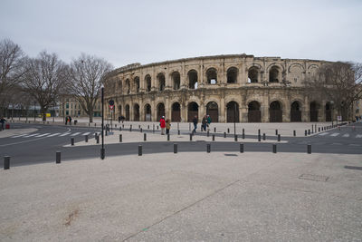 Group of people in front of historical building