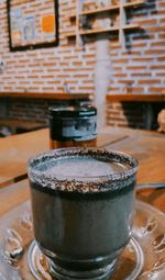 Close-up of coffee cup on table