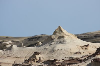 Scenic view of desert against clear sky