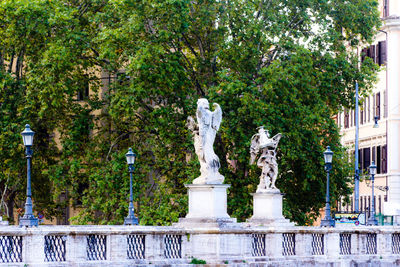 Statue of trees in city