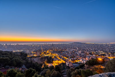 High angle view of townscape against sky during sunset
