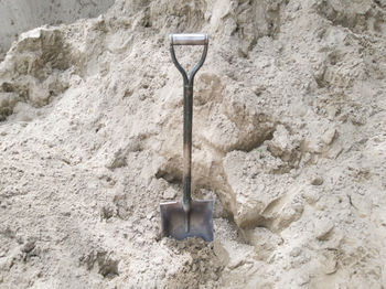 High angle view of metallic structure on sand