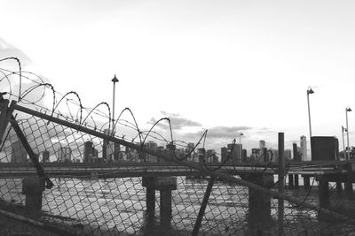 View of bridge over river in city