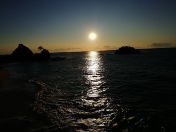 Scenic view of sea against sky during sunset