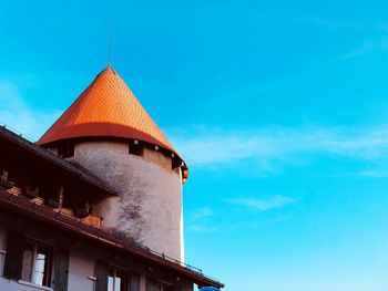 Low angle view of church against blue sky at slovenia in europe 