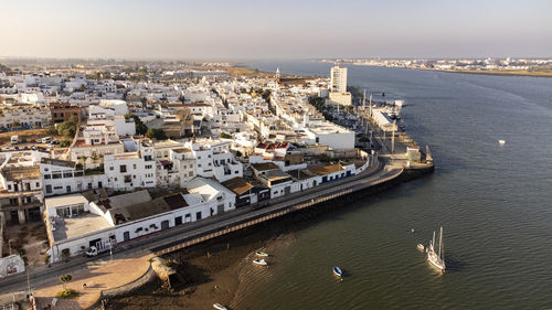 High angle view of boats moored at harbor