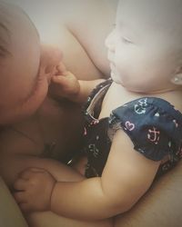 Close-up of baby sleeping in hands