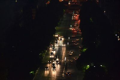 High angle view of illuminated city street at night