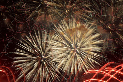Full frame shot of firework display at night