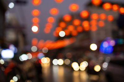 Defocused image of illuminated lights at night