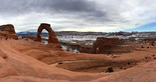 Panoramic view of rock formations against sky