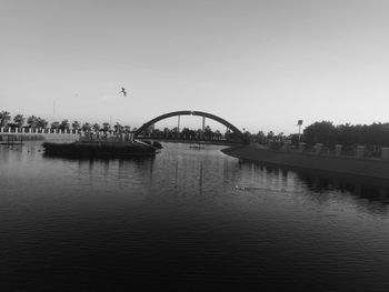 Bridge over river against clear sky