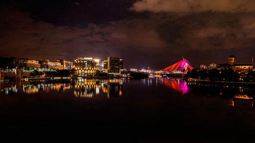 Illuminated buildings in city at night