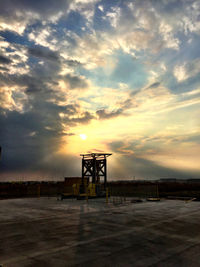 Scenic view of landscape against cloudy sky