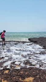 Scenic view of sea against clear sky