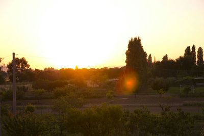 Scenic view of landscape at sunset