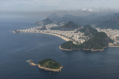 Beautiful aerial view to mountains, ocean and city