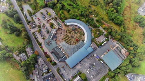 High angle view of buildings and trees in city