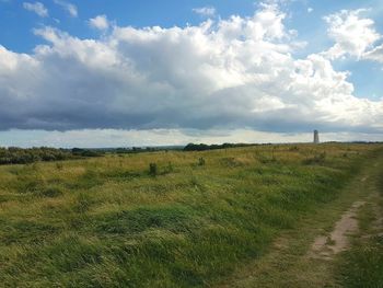 Scenic view of field against sky