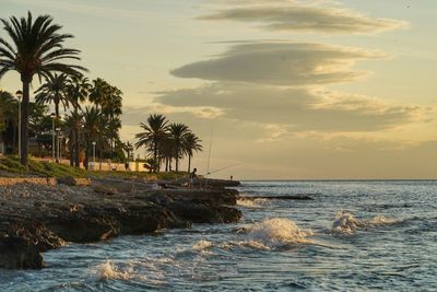 Scenic view of sea against sky at sunset