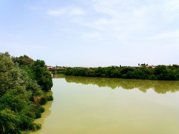 Scenic view of river against sky