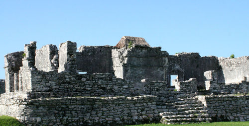 Low angle view of castle against clear blue sky