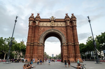 Tourists in front of building