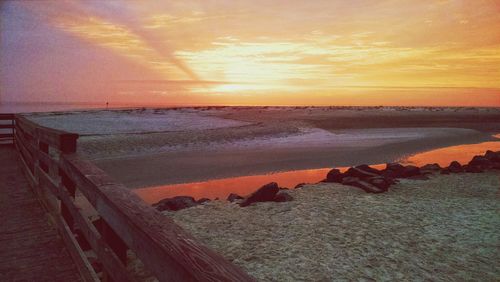 Scenic view of sea at sunset