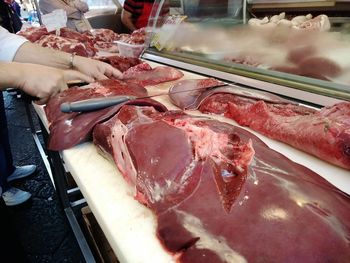 Man working at market stall