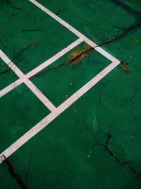 High angle view of arrow sign on road