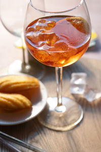 Aperol spritz with madeleines