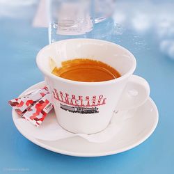 High angle view of coffee served on table