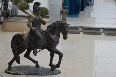 Low angle view of statue against blurred background