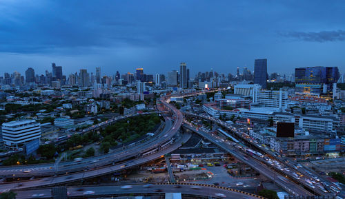 High angle view of city buildings against sky