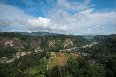 High angle view of trees on landscape against sky