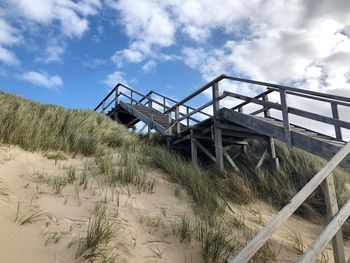 Low angle view of staircase against sky