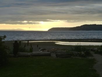 Scenic view of sea against sky during sunset