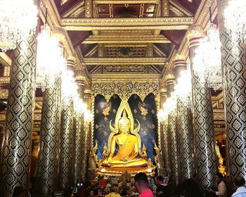 Low angle view of buddha statue