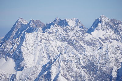 Snow covered mountain against sky