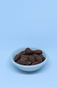 Close-up of bread against white background