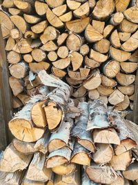 Full frame shot of logs in forest