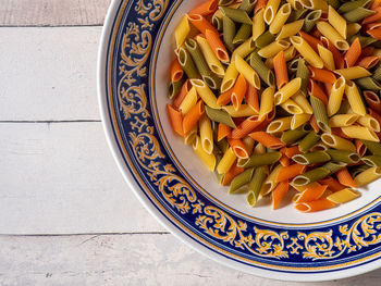 High angle view of fruits in plate on table