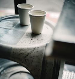 Close-up of coffee cup on table