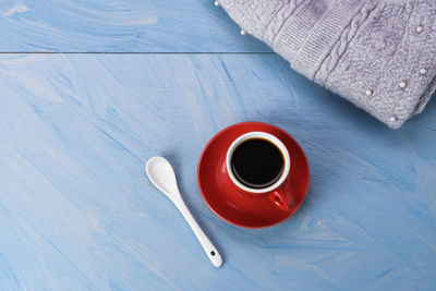 High angle view of coffee cup on table