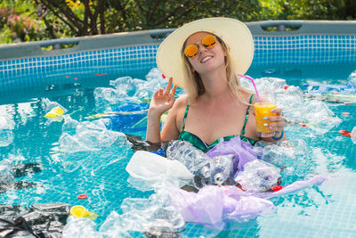 Young woman in swimming pool