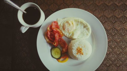 High angle view of breakfast served on table