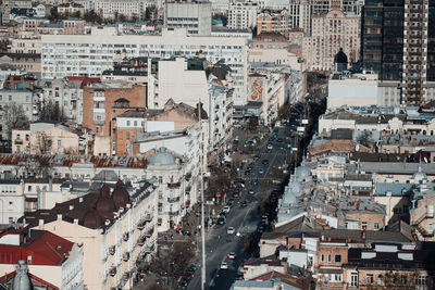 High angle view of street amidst buildings in town