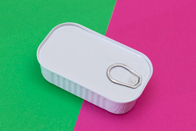 High angle view of usb stick on yellow background