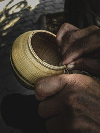 Close-up of man playing guitar