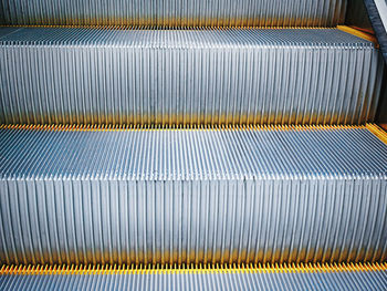 Full frame background of close-up escalator stairs